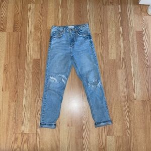 Slightly distressed denim jeans
